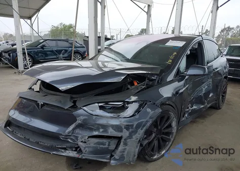2023 Tesla Model X Dual Motor All-Wheel Drive/Standard Range z USA, uszkodzony, nr VIN 7SAXCDE54PF411921